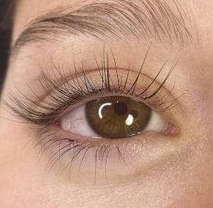 Soft lash lift and tint results enhancing natural lash length.